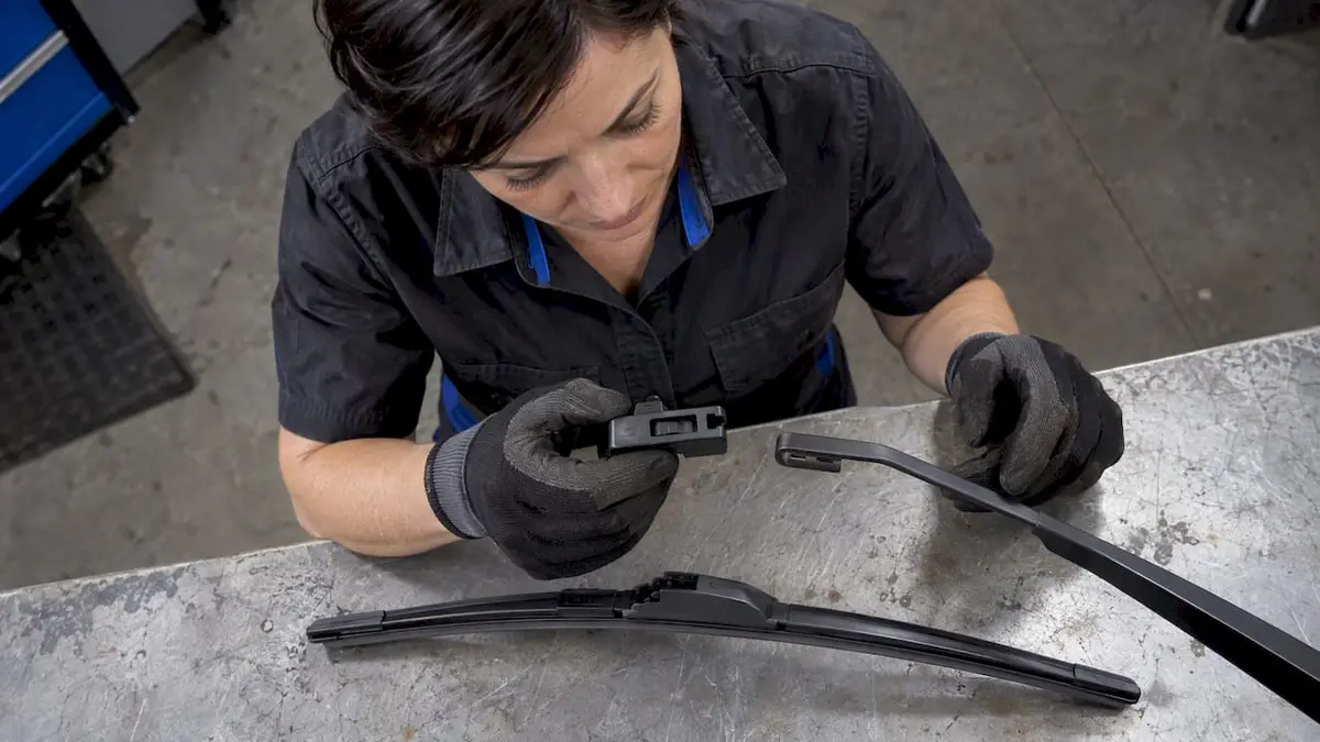 Mechanic checking wiper adapter fit